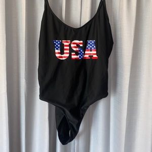 WORN ONCE and washed. USA black one piece swim suit